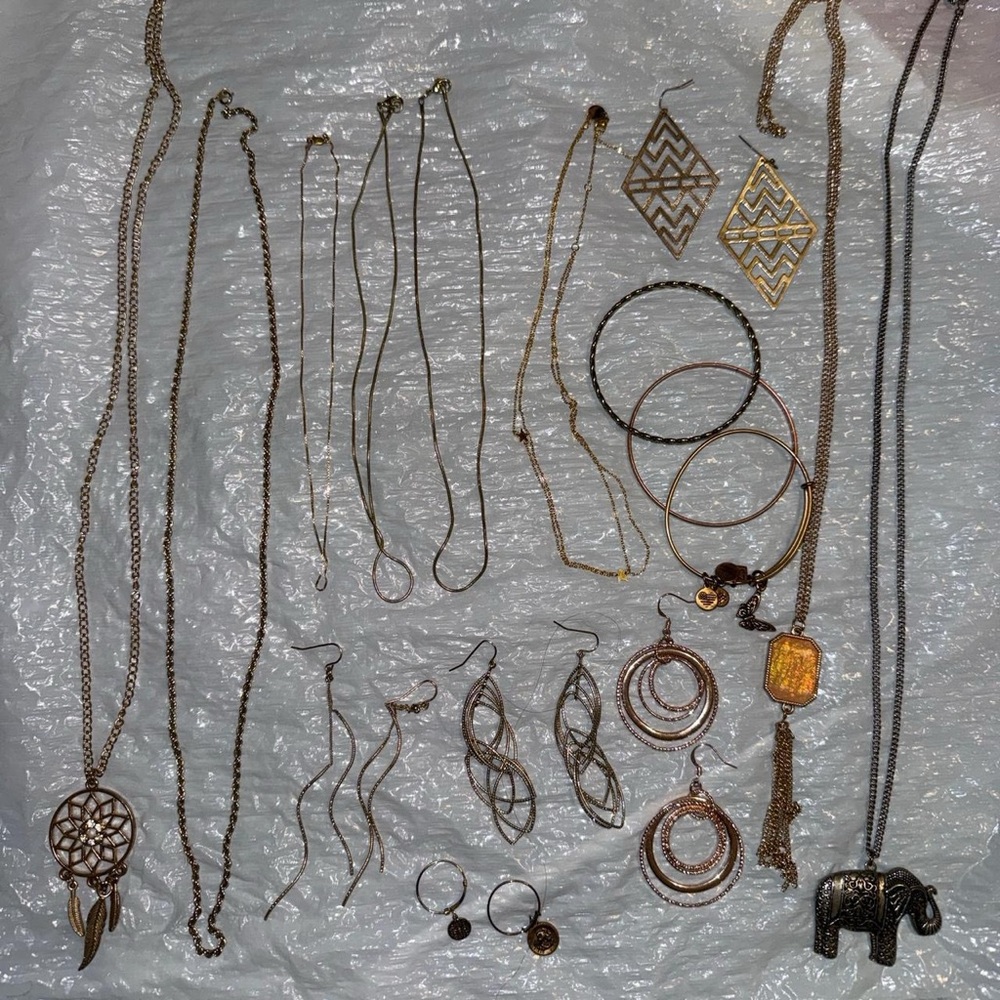 Large random funky jewelry bundle with necklaces, earrings, and bracelets